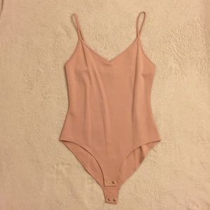 3 for $15!!!! Light pink bodysuit! New with tags!